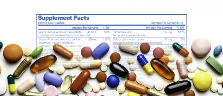 Health themes. Large group of assorted capsules and pills making a frame on white background. Space for text.