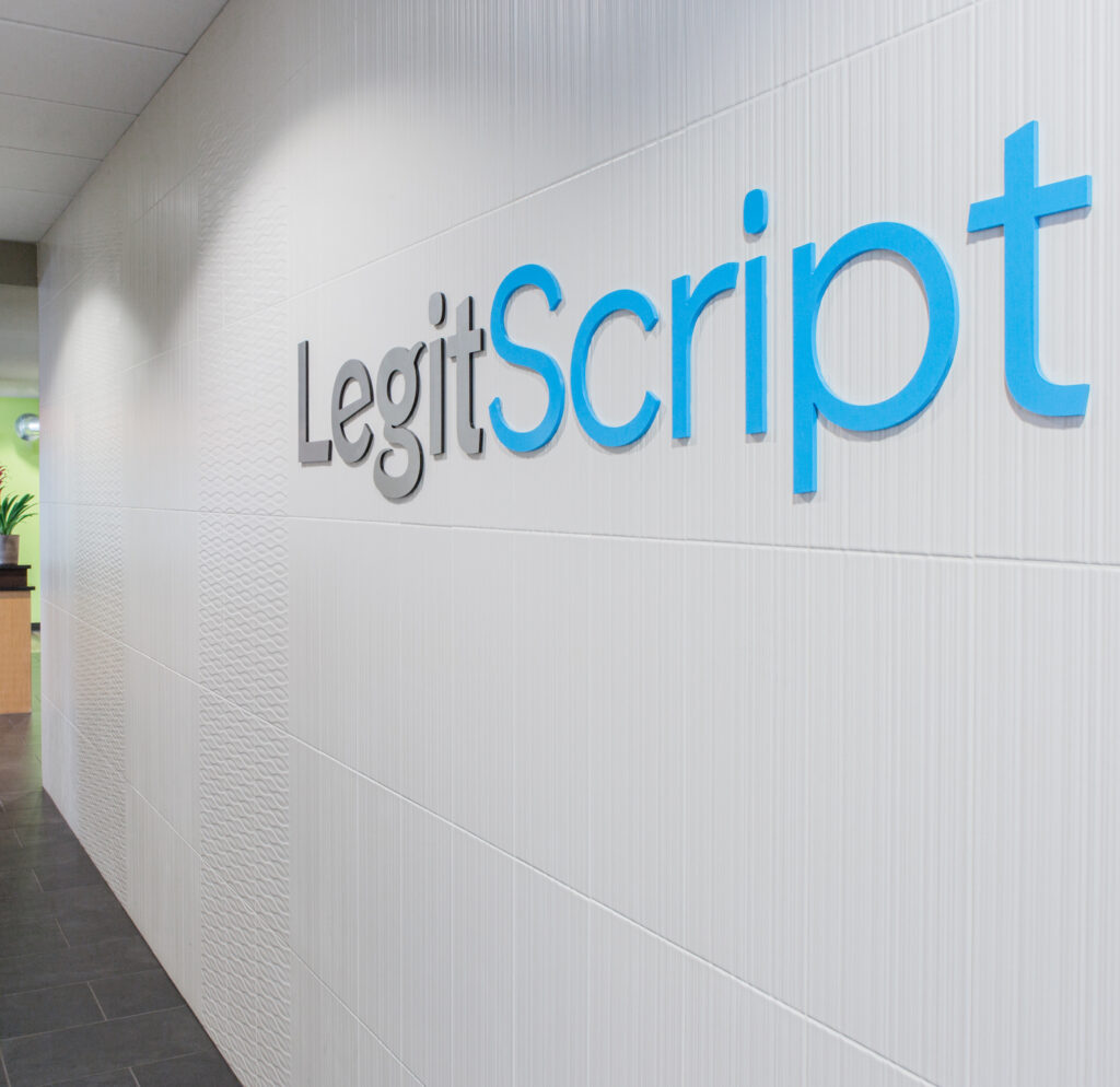 LegitScript sign in company hallway