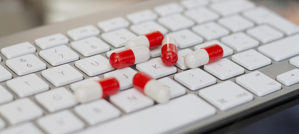 Pills on a keyboard
