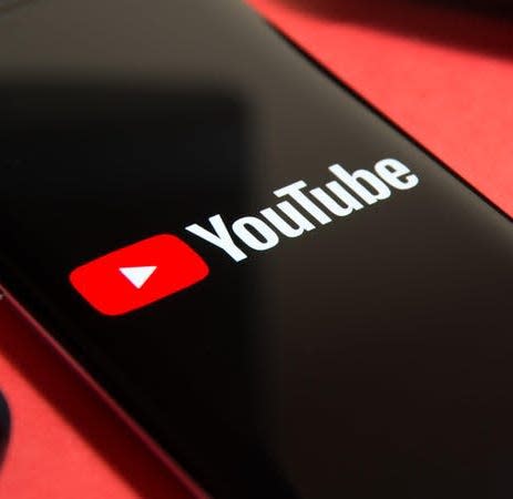 mob ile phone with YouTube logo on it