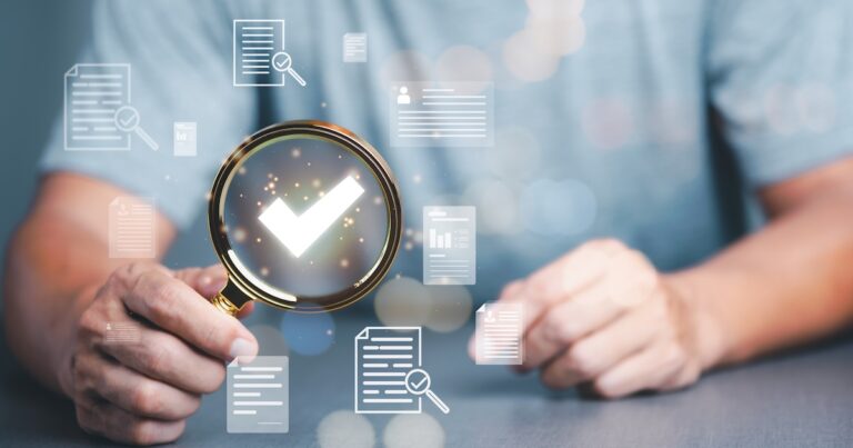 Businessman Audit documents, quality assessment management With a checklist, business document evaluation process, market data report analysis and consulting, plan review process.
