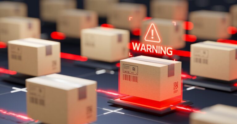 Red warning sign over cardboard box. Safety and security on sorting and storage lines. Automatic logistics management concept.