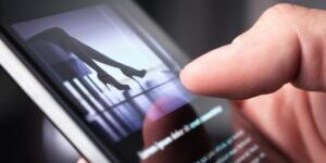 Man watching erotic video or looking at sexy photo with phone. Sex shop or online porn website. Person reading news article about sexual topic. Escort business, strip show or adult content on internet