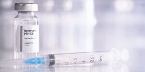 A vaccine vial and syringe with a GLP1 Peptide Retatrutide